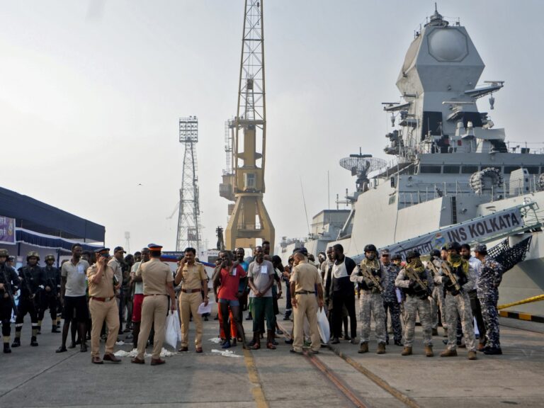 Captured Somali pirates arrive in India to face trial over ship hijacking