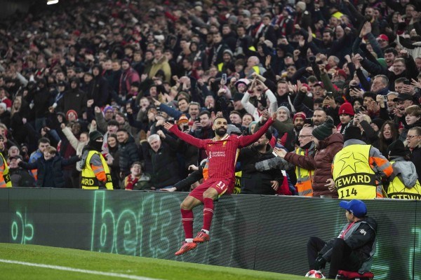 Liverpool beats Lille to reach Champions League round of 16. Barcelona wins 9-goal thriller