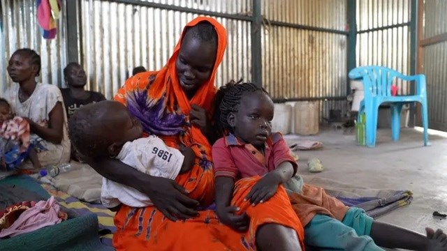 The mother and children trapped between two conflicts