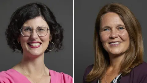 UK Parliament A composite of two official Parliamentary portraits of Layla Moran and Vikki Slade. Moran has jaw-length curly black hair, hoop earrings, silver-rimmed glasses and a pink top. Slade has shoulder length light brown hair, a black and white top and a purple jacket.
